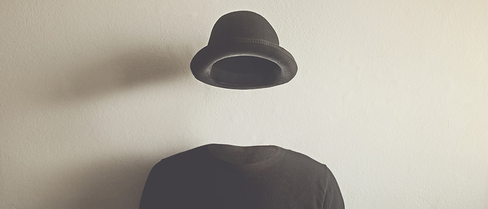Invisible man wearing a bowler hat and pullover