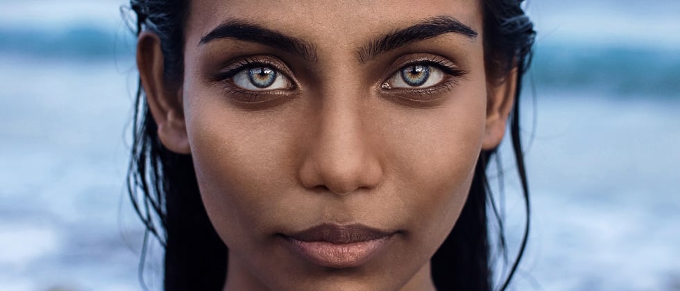 Close up woman as symbol for eye contact attraction