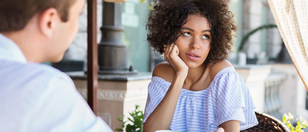 Woman looks thoughtful because he loses interest