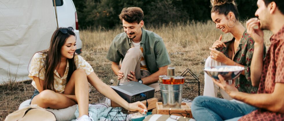 Two couples have a picnic together as an example of double date ideas