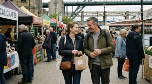 A couple walking together at the quayside market on a date in newcastle.