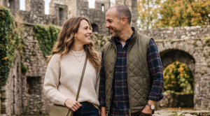 A couple standing in front of plymton castle in plymouth. (Generated with AI)