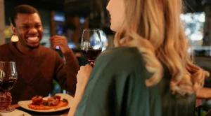 A couple enjoying dinner in a restaurant.