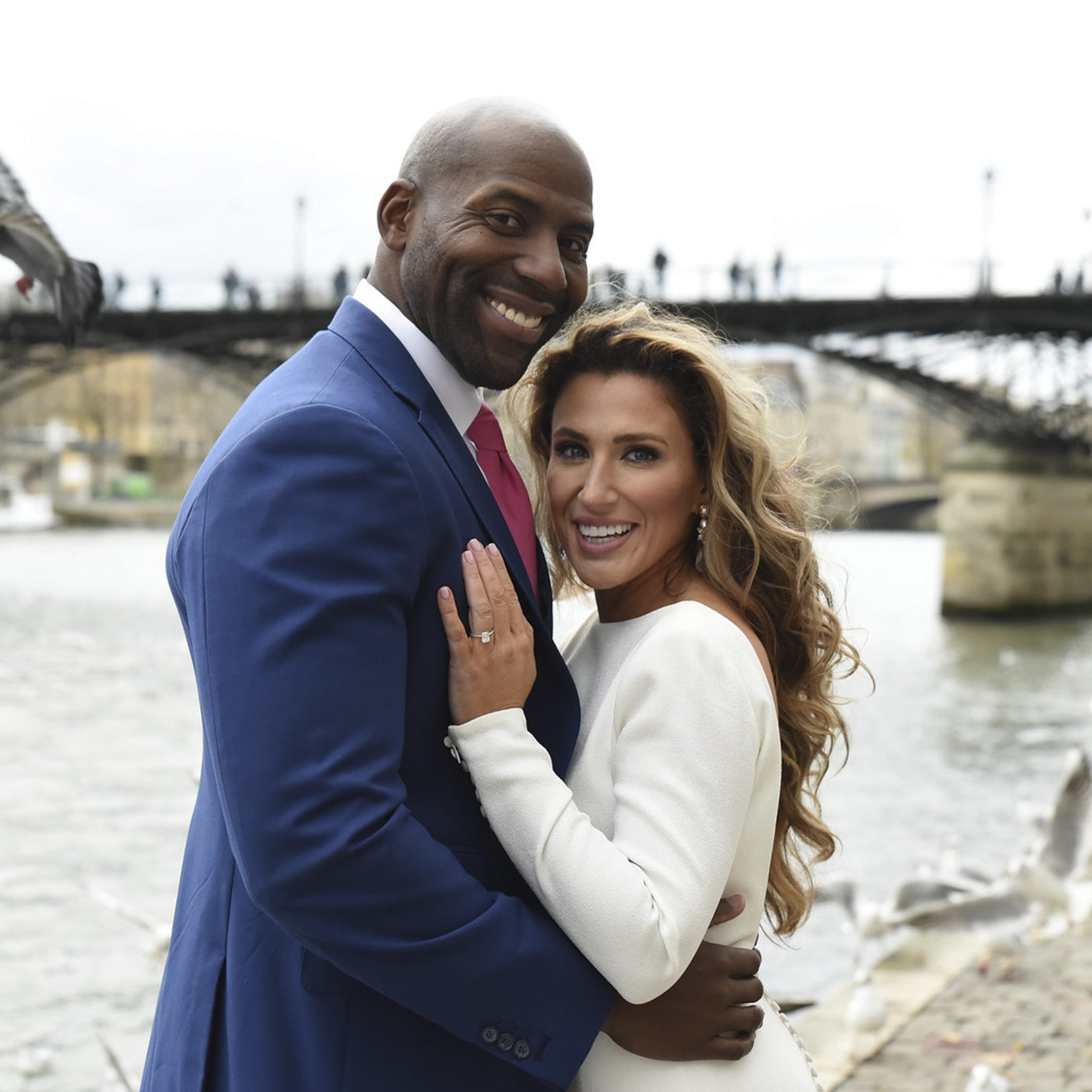 Brittany & Willie smiling at the camera as eharmony success story.