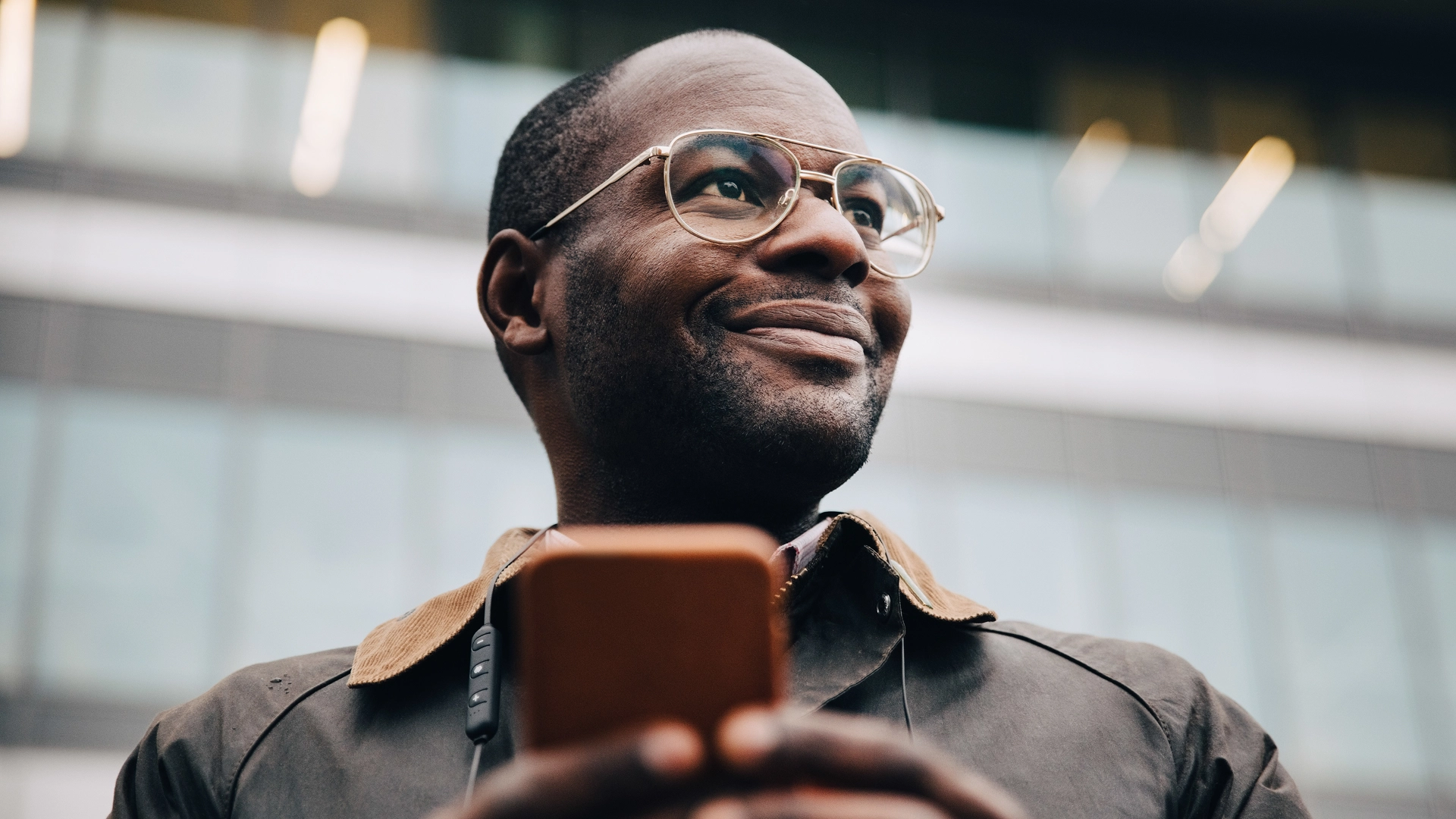 Black Single browsing through Black Dating Apps on his mobile.